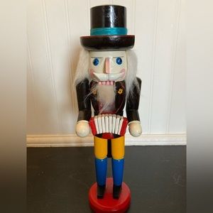 Vintage 1990s nutcracker German accordion player
